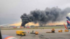 Treisprezece morţi după aterizarea de urgenţă a unui avion în flăcări